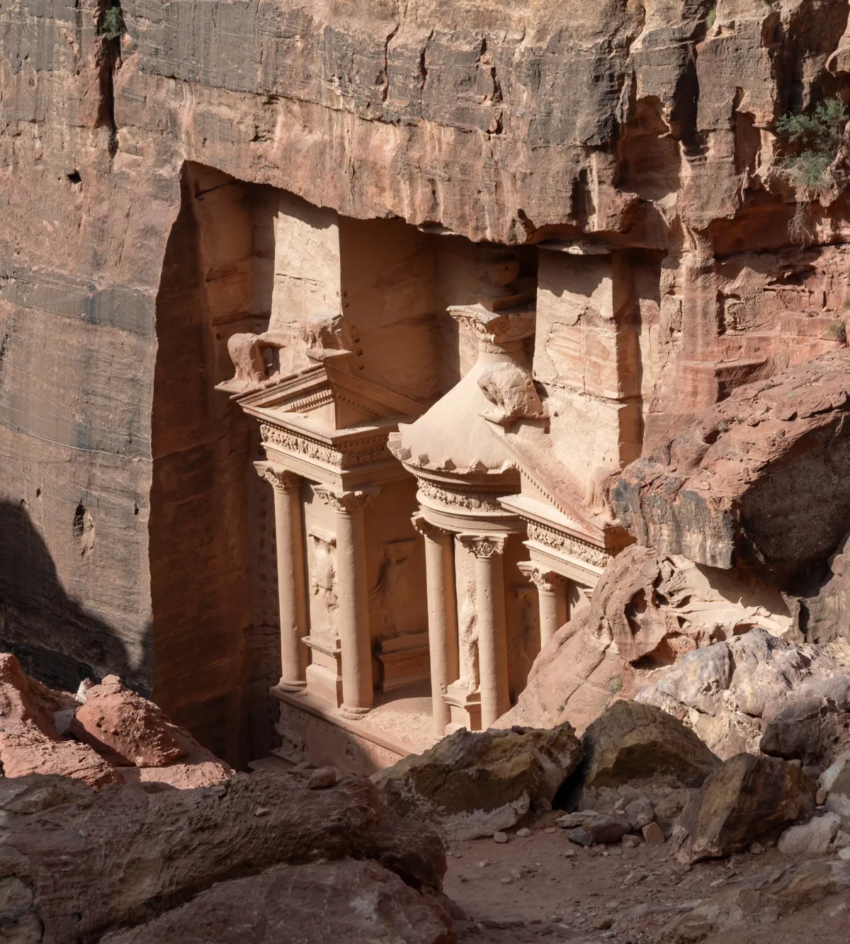 A shadowed, lesser-known rock-cut tomb off the main trail, Petra, Jordan